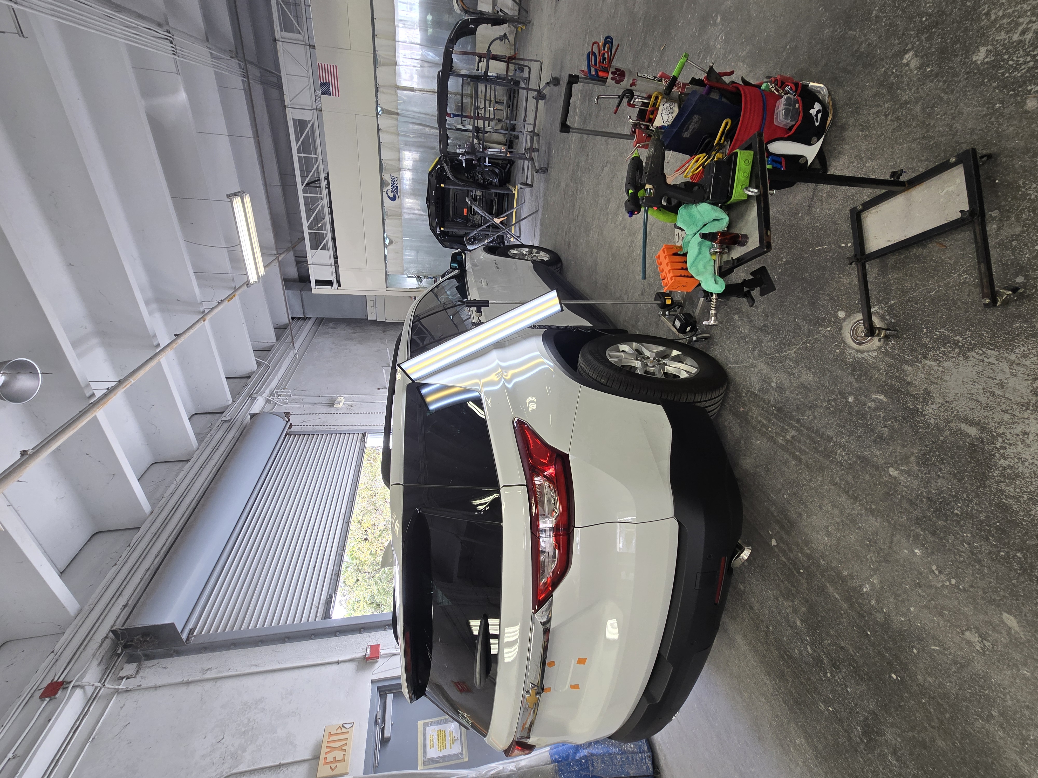 Shop repair white SUV