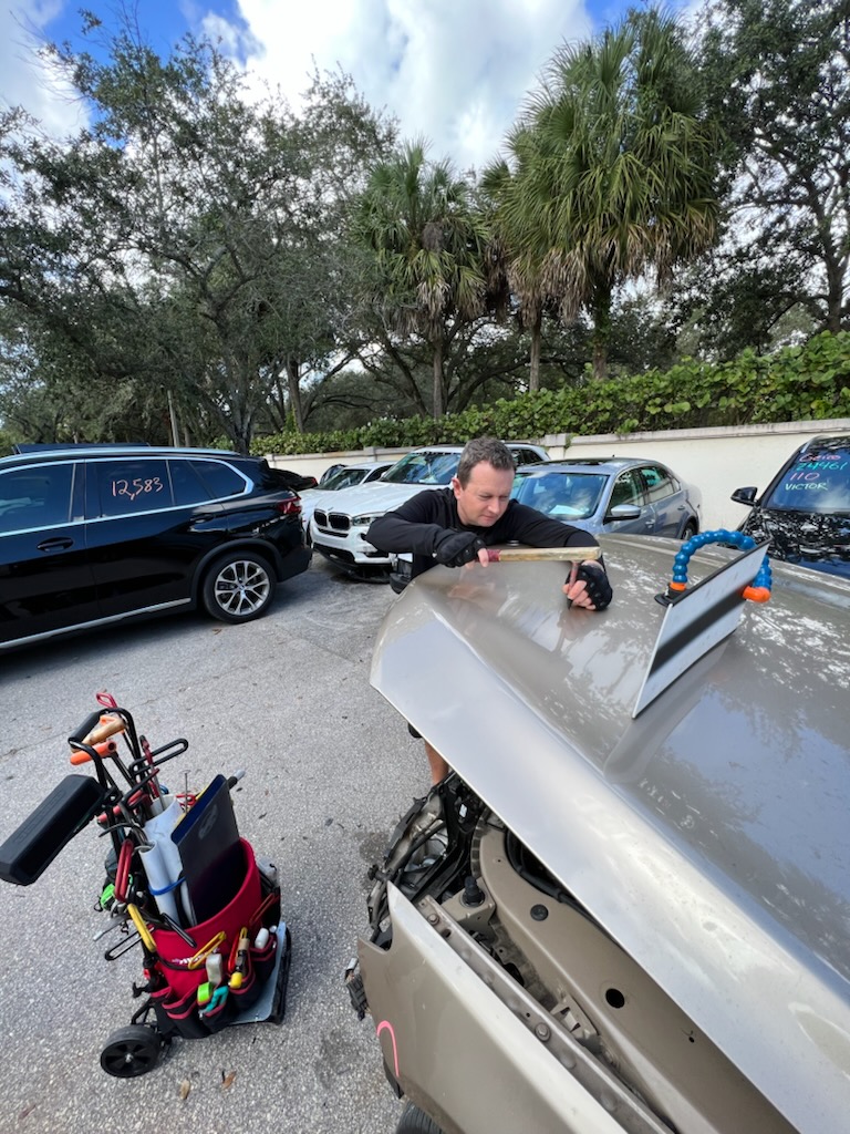Hood repair at dealership