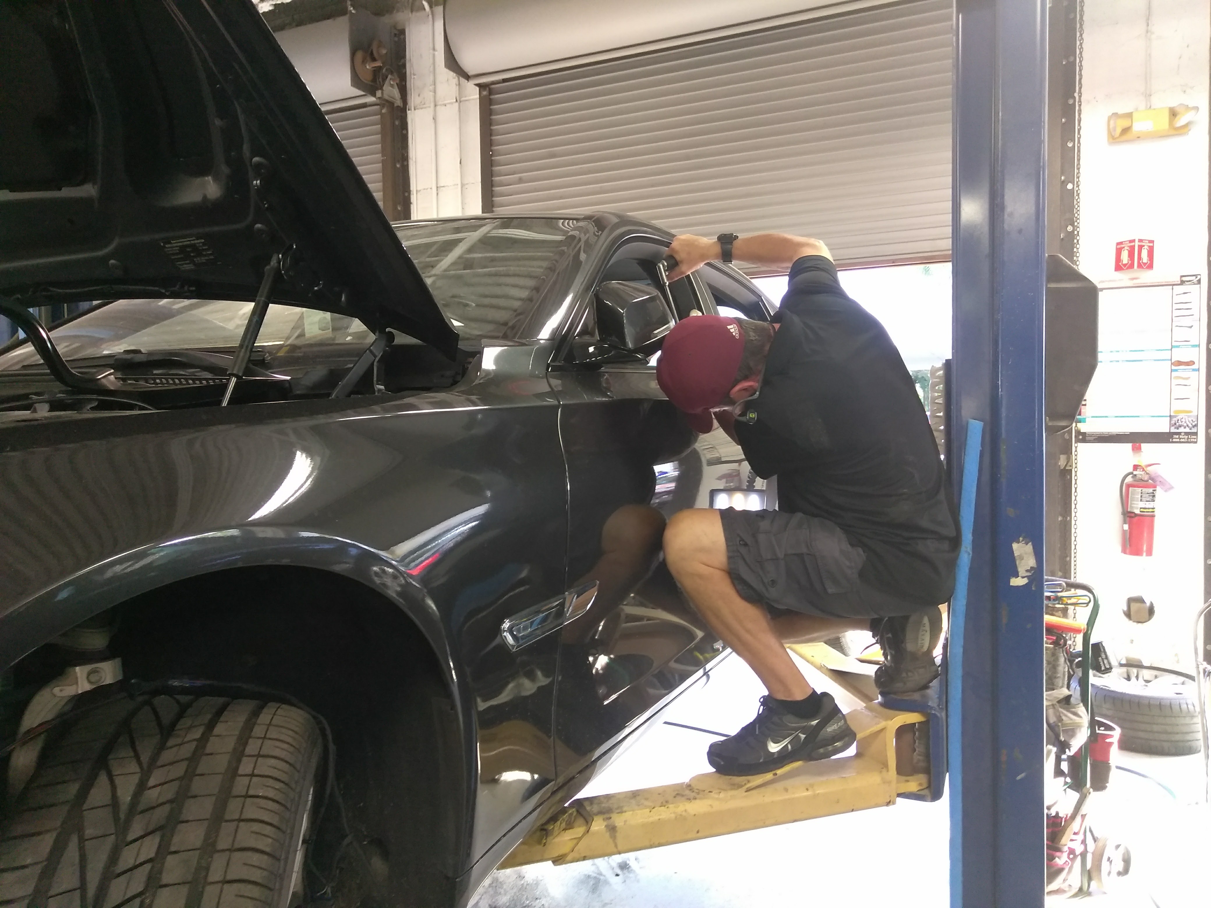 Lifted vehicle shop repair