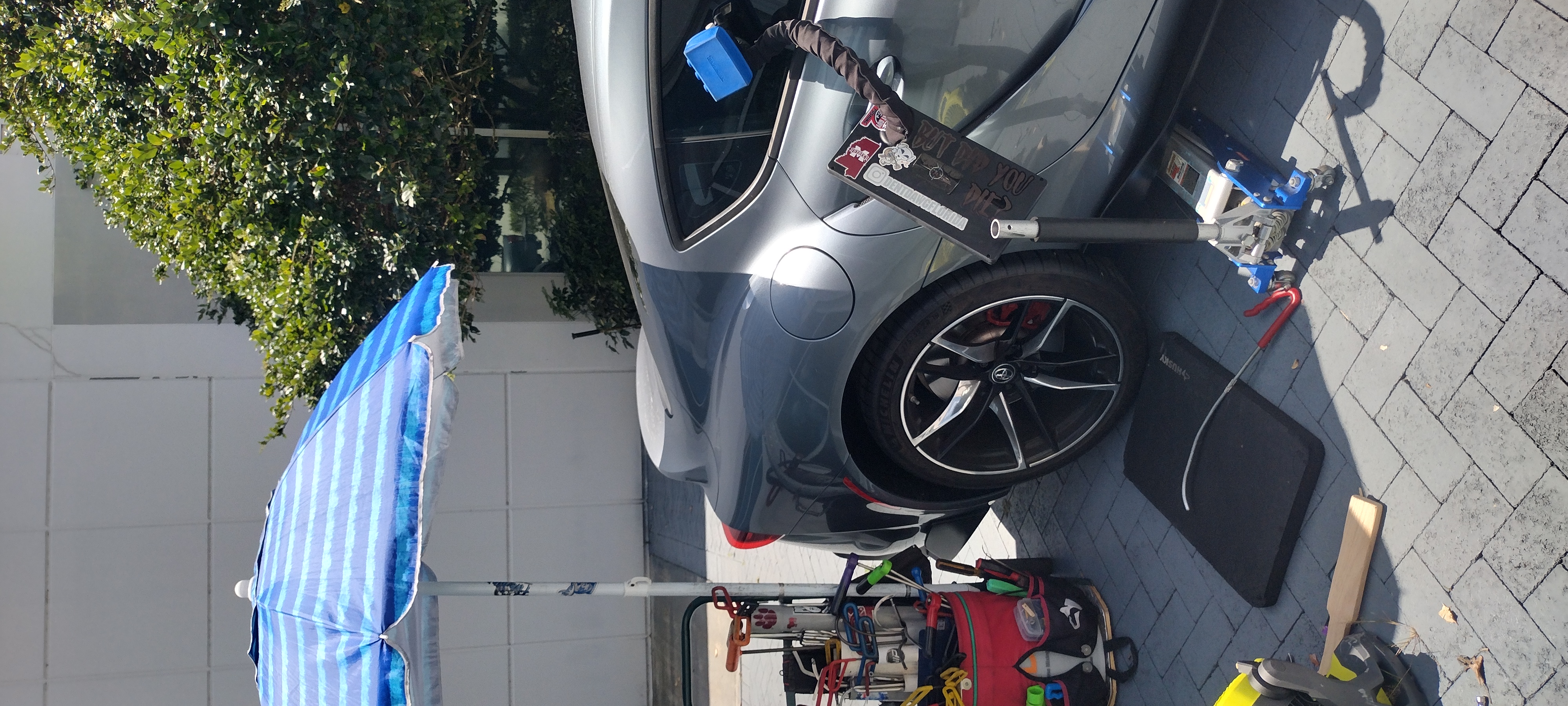 Mobile PDR repair on sports car